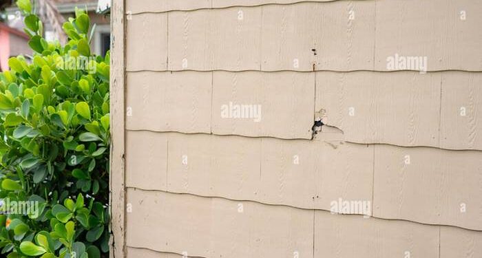 Asbestos siding on exterior house wall at a South Florida neighborhood ...